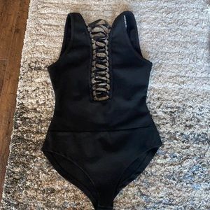 Lace Up Black Bodysuit from Revolve